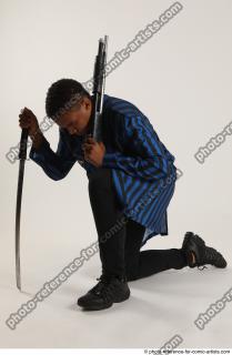 02 GARSON KNEELING POSE WITH KATANA AND SHOTGUN